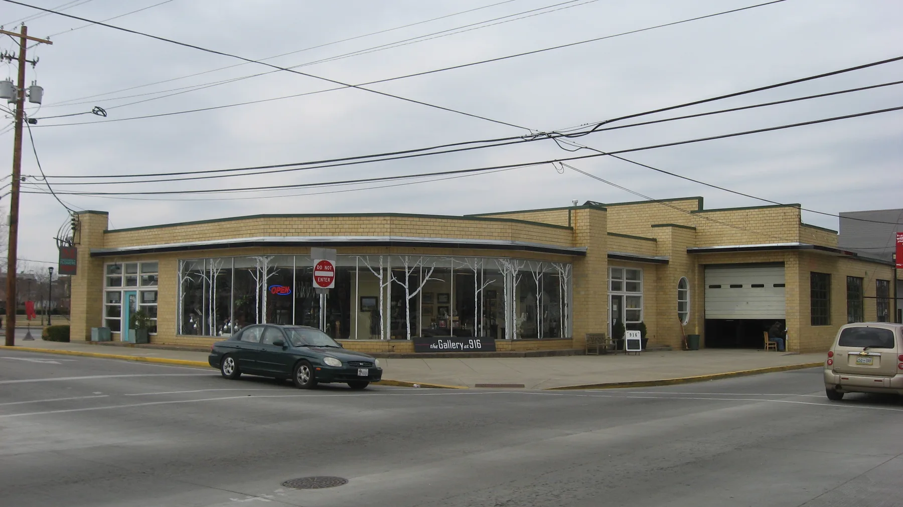 A brick commercial building on State Street in Bowling Green's Modern Automotive District, now an art gallery