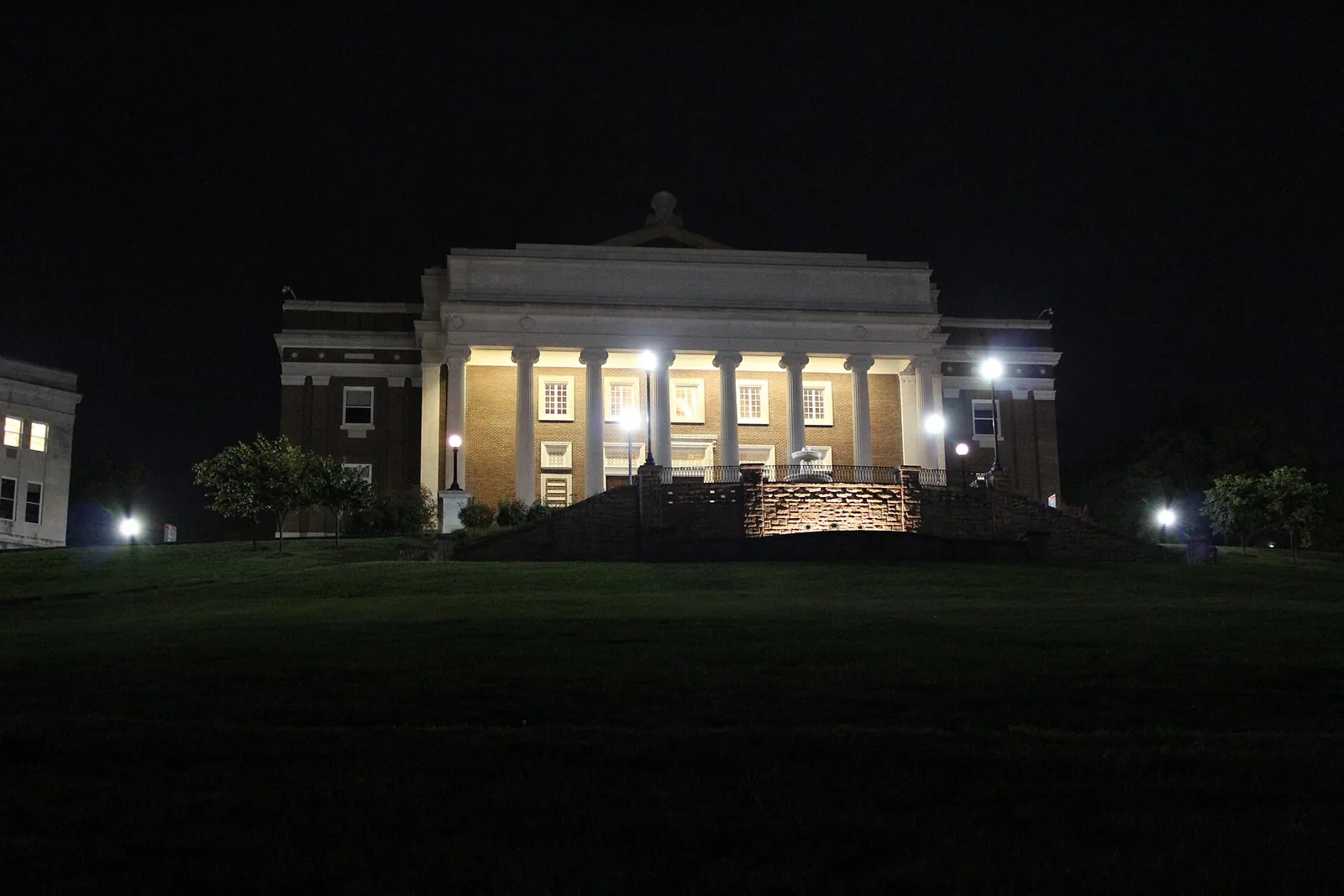 Van Meter Hall, Western Kentucky University's auditorium for concerts and performances, lit up at night in Bowling Green
