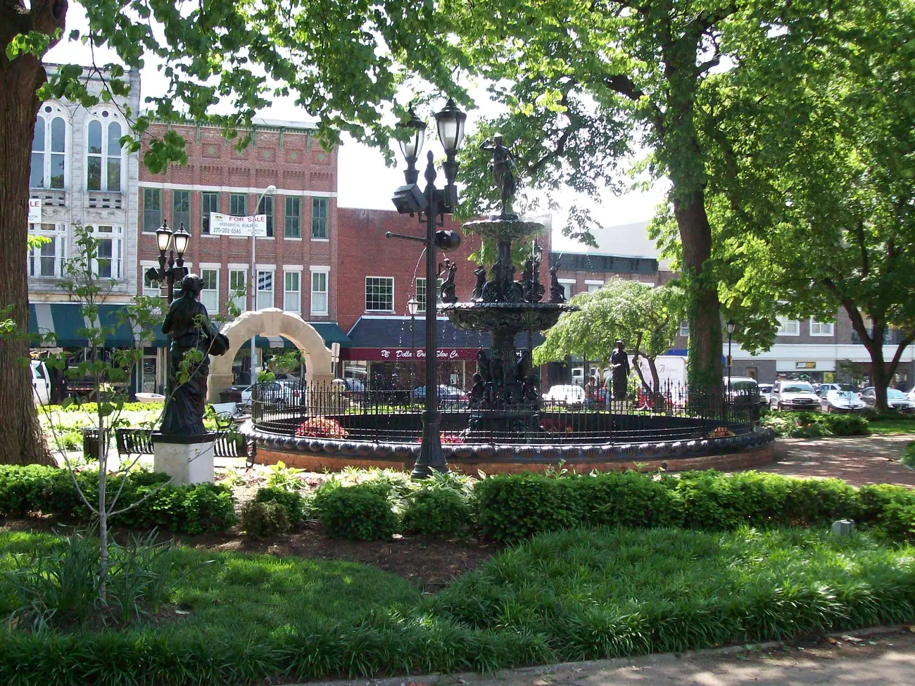 The fountain and statues in Fountain Square Park in downtown Bowling Green, where Duncan Hines Days opens