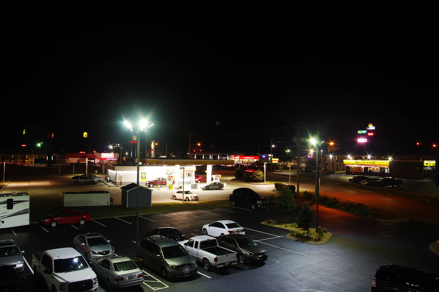 Businesses lit up at night at Scottsville Road and Mel Browning Street in Bowling Green
